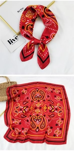 Detailed views of red paisley silk square scarf with floral patterns and satin finish