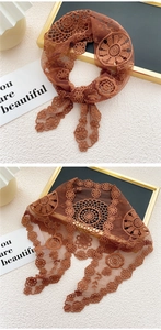 Broderie détaillée d'une écharpe triangle en dentelle florale marron en maille fine