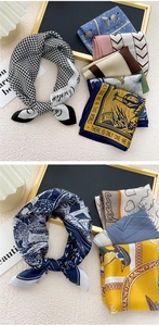 Detail of silk square scarf showing satin texture and elegant patterns with a knotted finish
