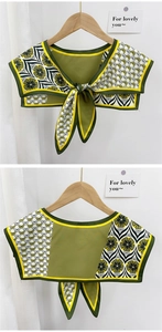 Detail of vintage patchwork scarf shawl with olive green floral print and tie-front knot