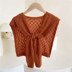 Caramel orange knit shawl wrap with hollow crochet pattern and front tie knot design