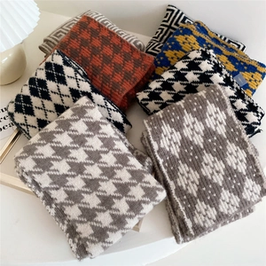 Thick knitted winter scarves for women in various colors and patterns like houndstooth