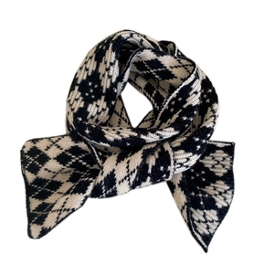 Thick knitted scarf with black and white diamond patterns and snowflake jacquard texture