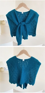 Peacock blue knitted shawl featuring intricate hollow-out diamond patterns and lace edges
