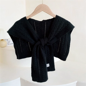 Knitted black shawl wrap with hollow-out pattern and front tie for autumn layering