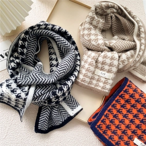 Long knitted houndstooth scarf for women featuring thick warm fabric in multiple colors