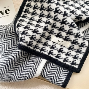 Thick knit houndstooth scarf with classic black and white double-sided patterns for winter