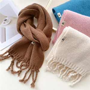 Thick knitted tassel scarf for women in brown, sky blue, pink and off-white colors
