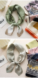 Detailed view of various silk scarves featuring paisley, polka dots and geometric patterns