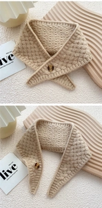 Close-up of beige knit scarf with soft texture and stylish amber pattern button detail