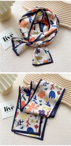 Detailed pattern of floral narrow silk scarf with abstract heart prints and navy borders
