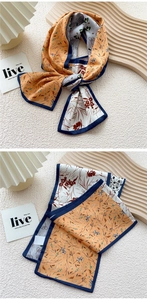 Detail of multi-pattern silk scarf with floral prints and premium stitched edging