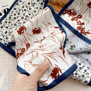 Elegant floral silk texture scarf for women with soft drape and refined print details