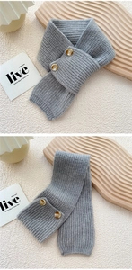 Detailed knit texture and wooden buttons on a grey winter knitted neck warmer