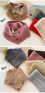 Detail of knitted neck warmer with diamond pattern and vintage three-button closure