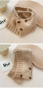 Close-up of knit neck warmer with marble buttons and elegant ruffle edge texture