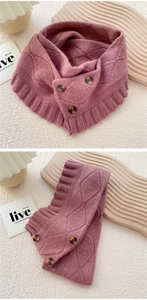 Close-up of pink knit neck warmer with diamond pattern and three adjustable amber buttons