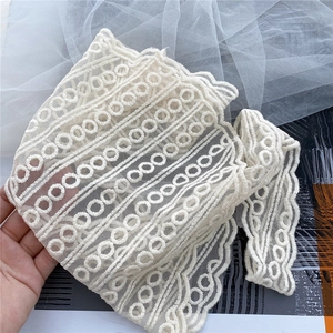 Elegant ivory lace neck scarf with embroidered circular hollow patterns and wavy edges