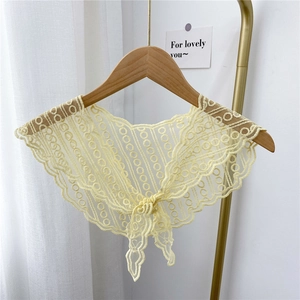 Pale yellow lace neck scarf with hollow floral patterns and decorative front bow tie