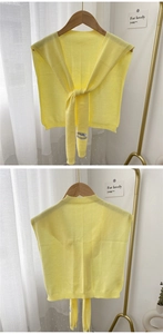 Detailed knit texture of light yellow knitted shawl with front and back tie views