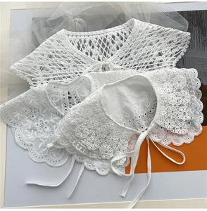 Three white lace decorative collars featuring embroidery and floral crochet details
