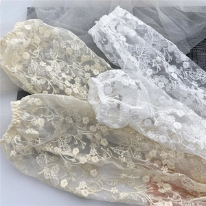 Elegant floral lace arm sleeves in cream and white with delicate embroidery for women
