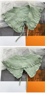 Detail of light green ruffled cotton collar with tie strings and layered wood ear edges