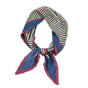 Pleated square silk scarf for women featuring geometric blue red and black stripe patterns