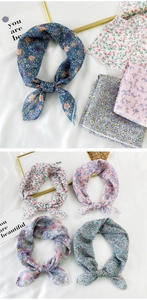 Detailed flat lay of floral cotton linen square scarves with vintage aesthetic props