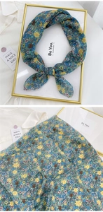 Close-up of floral pattern cotton linen scarf showing soft texture and vintage print