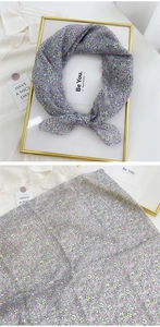 Detailed view of purple floral cotton linen scarf with elegant small flower print pattern