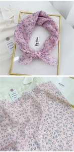 Detailed view of a pink floral linen scarf tied neatly for a refreshing pastoral style