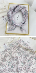 Detailed view of floral cotton linen neckerchief with pink and green patterns