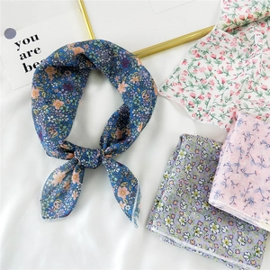 Set of four floral cotton linen scarves in blue and pink tones with delicate hemming