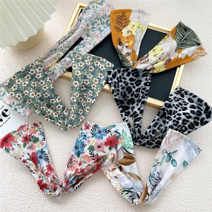 Floral and leopard print wire hair bands for bun styling in various fabric patterns