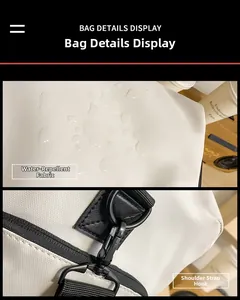 Détails du tissu oxford imperméable et du crochet de bandoulière du grand sac de voyage