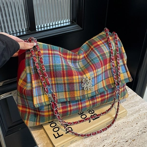 Retro plaid tote bag with red leather chain strap and metallic logo for daily commute