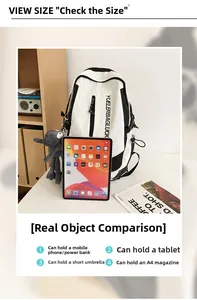 Detailed internal view of large capacity backpack holding tablet, A4 magazine and umbrella