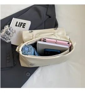 Interior view of spacious beige tote bag showing large capacity for tablet and daily items