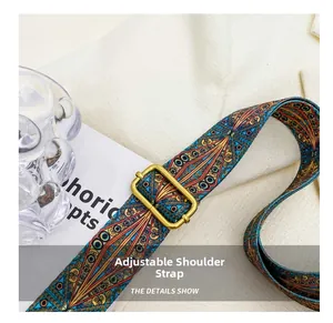 Detail of adjustable bohemian shoulder strap with colorful patterns and gold buckle