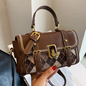 Classic vintage satchel bag with argyle fabric panels and gold hardware in brown