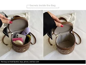 Detailed capacity view of quilted brown bucket bag holding phone and essentials