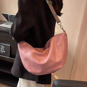 Pink large capacity hobo bag with a decorative wide floral shoulder strap for women