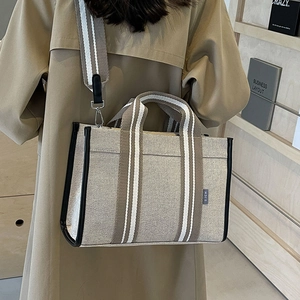 Sac cabas minimaliste en toile beige avec bandoulière rayée amovible pour femmes