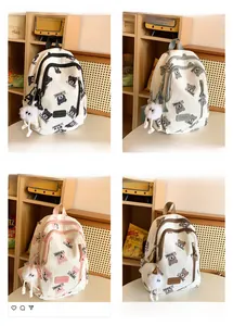 Collage of four multicolor casual backpacks with cartoon bear patterns and furry pendants