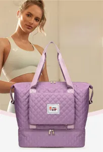 Detail view of purple quilted travel bag with dedicated dry wet separation compartment