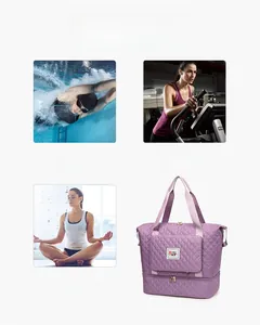 Detail of purple quilted travel bag with separate bottom shoe compartment and logo patch