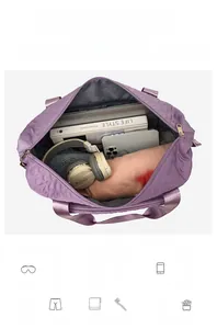 Top view of spacious purple quilted travel bag showing organized interior storage space
