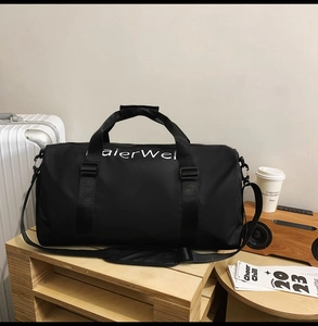 Detail of durable black oxford tote with double handles and adjustable shoulder strap