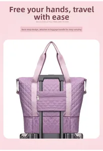 Detail of purple quilted oxford tote bag with rear trolley sleeve for suitcase attachment